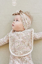 Load image into Gallery viewer, Baby headband featuring a green, pink, and beige all over print.