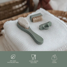 Load image into Gallery viewer, Baby Grooming Kit including a hairbrush, clippers, and a nail brush.