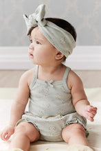 Load image into Gallery viewer, Baby blue headband with a white floral all over print.