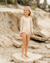 Load image into Gallery viewer, Long Sleeve rashguard one piece with ruffle around the waist and a floral print.