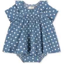 Load image into Gallery viewer, Blue baby romper with a ruffle neckline and a white polka dot all over print.
