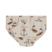 Load image into Gallery viewer, Beige coloured baby swim bloomers featuring an anchor, boat, and sailboat all over print.
