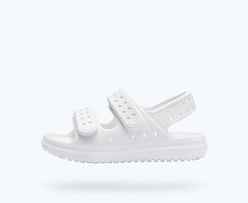 White sandles from Native Shoes featuring two adjustable straps for a snug fit. 