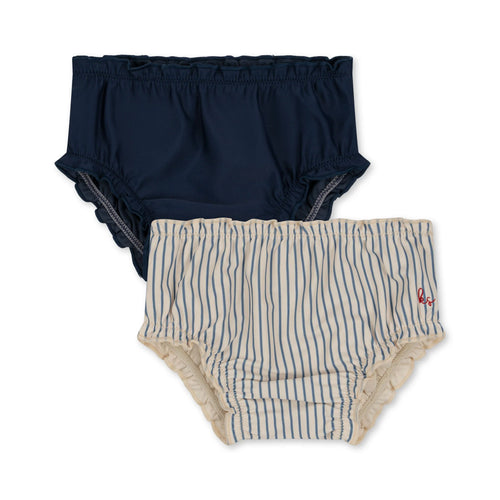 2-pack of baby swim pants featuring one navy blue set, and a blue stripe set. 