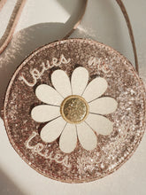 Load image into Gallery viewer, Children&#39;s round shoulder bag featuring a pink all over glitter and daisy on the front. 
