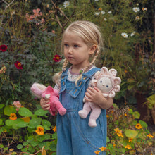 Load image into Gallery viewer, Dinky Dinkums Doll named Rose. Rose comes in a light pink onesie, with light pink short curly hair. Rose also has blue eyes.
