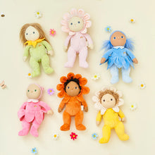 Load image into Gallery viewer, Pink Dinky Dinkum Doll with pink hair and pink dress with flower skirt. This photo displays all he blossom buds in the collection. There are size including one pink, orange, yellow, blue, light pink, and green. 
