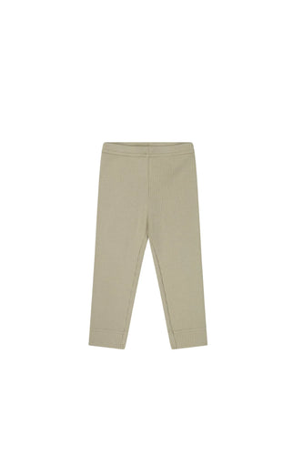 Beige baby legging with a ribbed fabric on organic cotton. 