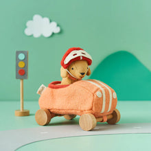Load image into Gallery viewer, Girl dog plush toy made from a wool blend. Comes with a wool blend plush car and removable hat.
