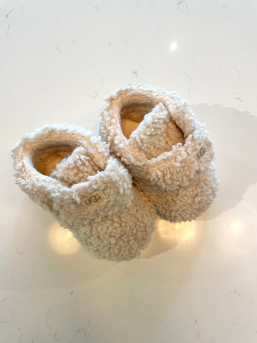 Teddy Ugg baby booties with velcro strap for a snug fit. 