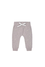 Load image into Gallery viewer, Jamie Kay track pant in a light pastel purple colour and white flower print. 
