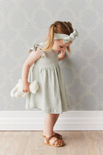 Load image into Gallery viewer, Baby Blue dress with flutter sleeves and a white floral all over print.
