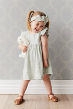 Load image into Gallery viewer, Baby Blue dress with flutter sleeves and a white floral all over print.

