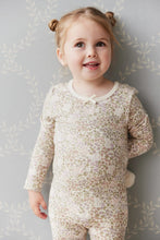 Load image into Gallery viewer, Floral Long Sleeve Tee with a bow on the neckline.
