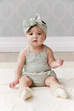 Load image into Gallery viewer, Baby blue bloomer with a white floral all over print.
