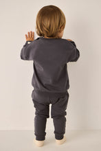 Load image into Gallery viewer, Organic cotton track pant featured in an indigo colour.
