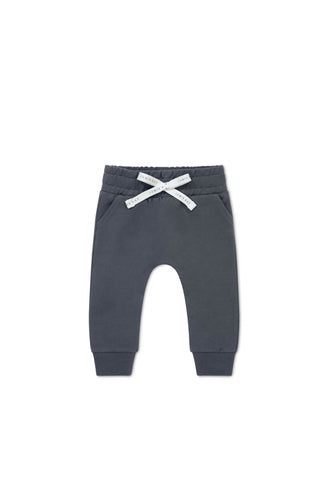 Organic cotton track pant featured in an indigo colour.
