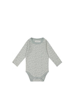 Load image into Gallery viewer, Jamie Kay long sleeve bodysuit in a baby blue colour with a white floral print.

