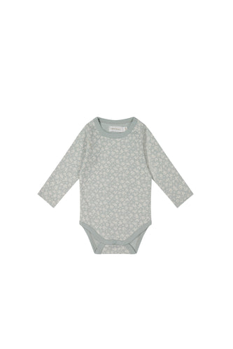 Jamie Kay long sleeve bodysuit in a baby blue colour with a white floral print.