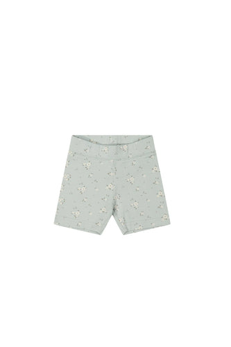 Baby Blue children's bike shorts with a white floral all over print. 