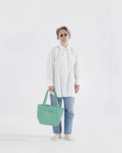 Load image into Gallery viewer, Mini cloud shoulder bag with an all over green gingham print.

