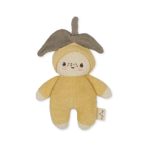 Mini lemon plush toy featuring a pastel yellow onesie and a stem hat made of organic cotton. 