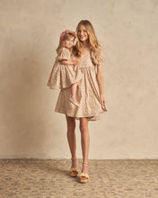 Load image into Gallery viewer, Baby doll dress with puffy sleeves and a gathered waist. This dress is featuring the wildflower print with pinks, greens, and beiges.
