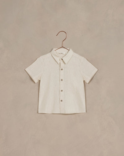 Ivory linen button up short sleeve shirt with collar. 
