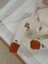 Load image into Gallery viewer, Organic cotton light beige onesie with contrast rust feet and an olive branch all over print.
