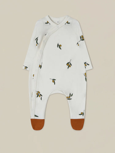 Organic cotton light beige onesie with contrast rust feet and an olive branch all over print. 