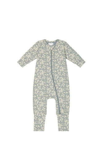 Blue one piece with zipper. No feet or hand covers. Onsie has a white floral pattern on it. 
