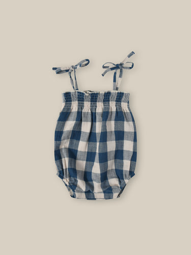 Organic cotton blue and white gingham printed bodysuit with spaghetti tie straps. 