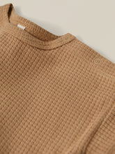 Load image into Gallery viewer, Terracotta clay coloured t-shirt on a waffle fabric.
