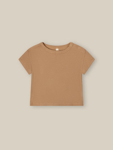 Terracotta clay coloured t-shirt on a waffle fabric.