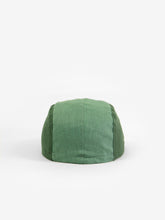 Load image into Gallery viewer, Baby cap featuring a five panel colour-block design. The colour block design features a light green, dark green, baby blue, and cream.
