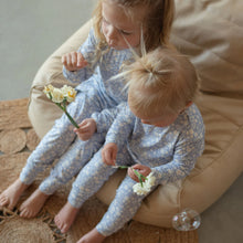 Load image into Gallery viewer, Lavender baby two-piece pyjamas with a peonies all over print.
