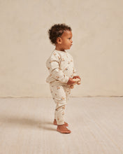 Load image into Gallery viewer, Beige coloured baby sweatpants with a tractor all over print.
