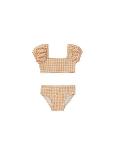 Orange and white gingham print baby two-piece bathing suit featuring puffy sleeves. 