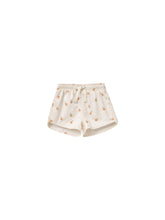 Load image into Gallery viewer, Beige coloured baby swim shorts featuring an oranges all over print. 
