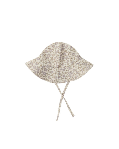 Beige sloppy sun hat with tie bottom for a secure fit and this hat features a blue floral all over print. 