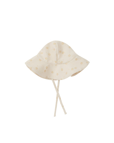 Ivory floppy sun hat with a tie bottom for a secure fit. This hat also features a sun all over print. 