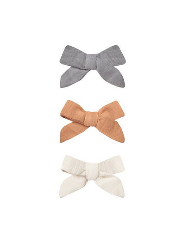 Hair clips on an alligator clip featuring cotton bows in the colour lagoon, melon, and ivory.