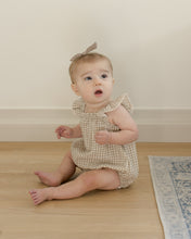 Load image into Gallery viewer, Flutter sleeves baby romper featured in a beige and oat gingham print.
