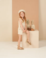 Load image into Gallery viewer, Beige knit shorts with a drawstring waistband.
