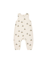 Load image into Gallery viewer, Cream coloured baby jumpsuit with a sailboat all over print. 
