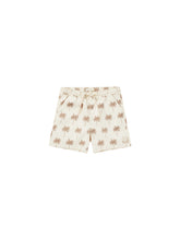 Load image into Gallery viewer, Cream children&#39;s swim shorts with beige palm tree all over print. 
