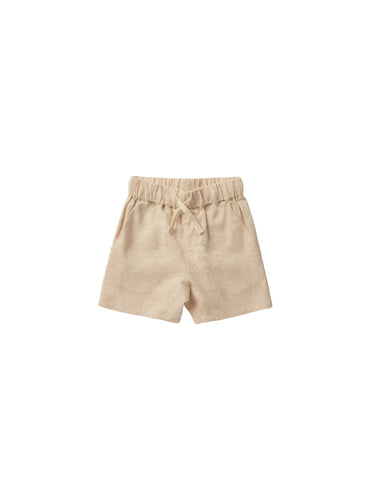 Linen blend children shorts featuring a warm beige colour. 