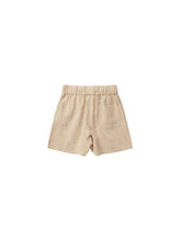 Load image into Gallery viewer, Linen blend children shorts featuring a warm beige colour.

