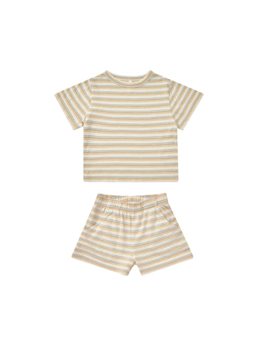 Tee and shorts matching set featuring a vintage stripe all over print. The vintage stripe pattern features beige, orange, and pale teal. 