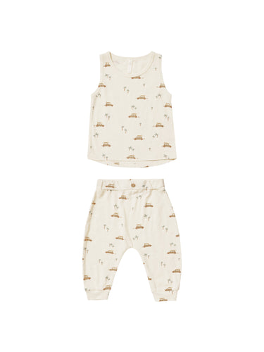 Beige tank and sweatpant featuring a surf buggy and palm tree print. 